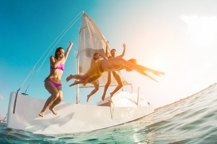 Happy,Crazy,Friends,Diving,From,Sailing,Boat,Into,The,Sea Happy,Crazy,Friends,Diving,From,Sailing,Boat,Into,The,Sea